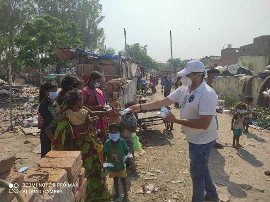 Food Packets and Face Masks to Needy People in Slum Areas and Shelter Homes by Road Side